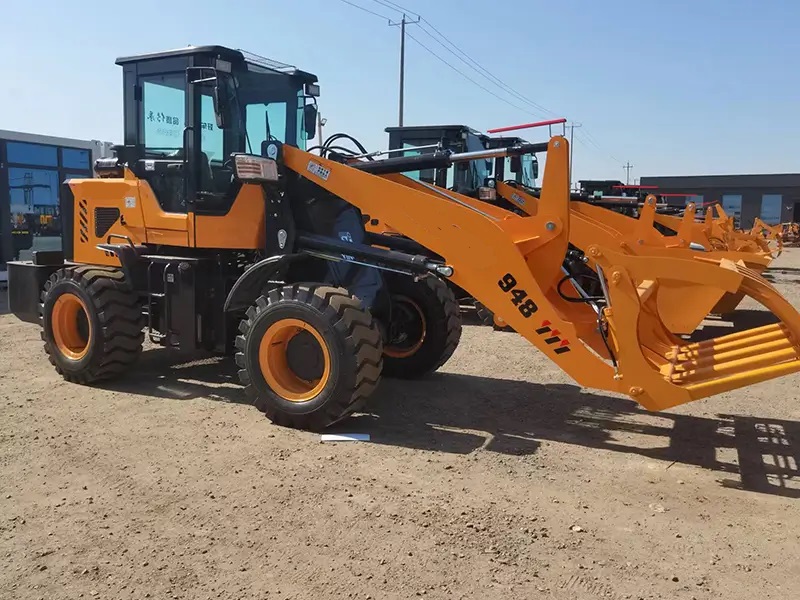 948 loader with clamp